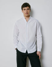 Carl white shirt