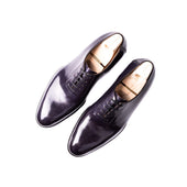 Wholecut Oxford With Stitching Around The Laces In Dark Purple Crust Calf