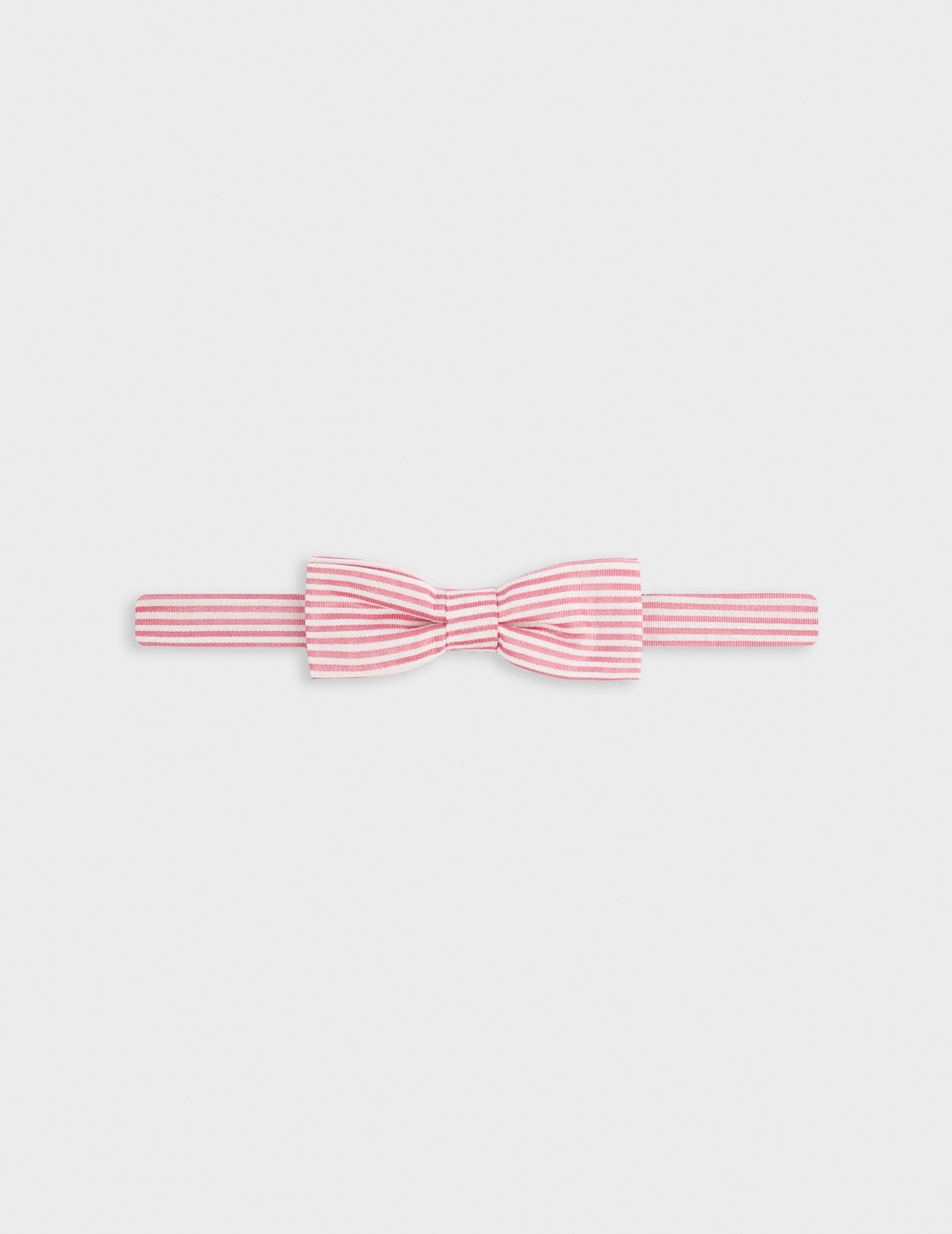 Striped pink cotton and silk seersucker bow tie