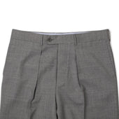 Manhattan Pleated High Rise Tapered Trousers In Fresco Wool