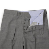 Manhattan Pleated High Rise Tapered Trousers In Fresco Wool