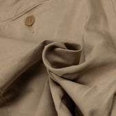 Manhattan Pleated High Rise Tapered Trousers In Beige Cotton Linen