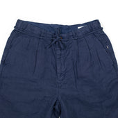 Pleated Tapered Trousers In Blue Washed Linen