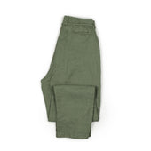 Pleated Tapered Trousers In Green Washed Linen