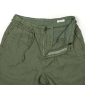 Pleated Tapered Trousers In Green Washed Linen