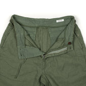 Pleated Tapered Trousers In Green Washed Linen