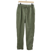 Pleated tapered trousers in olive green washed linen