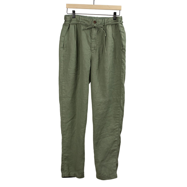 Pleated tapered trousers in olive green washed linen