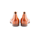 Chukka Boots With Curved Topline And Medallion In Chestnut Crust Calf
