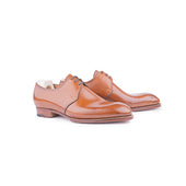 Three eyelet Derby with medallion in Cognac calf leather