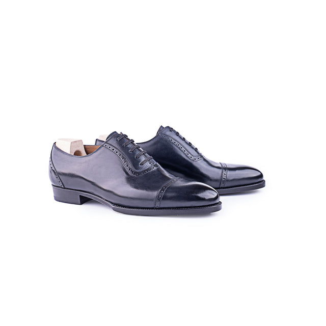 Straight toe Oxford, fully brogued in dark blue calf leahter