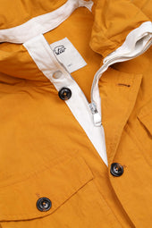 Concealed hood field Jacket in water repellent cotton-nylon fabric. Unlined. Yellow - Duck