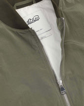 Baker bomber jacket in water repellent peach touch cotton/nylon fabric, unlined. Green - Alligator