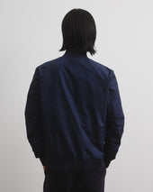 Packable Valstarino jacket in water repellent technical microfiber fabric. Blue - Navy