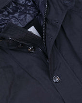 Down padded hooded jacket in a water repellent cotton blend fabric. Blue - Navy