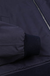 Padded zip jacket in a water repellent cotton-nylon blend fabric. Blue - Navy