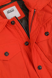 Padded field jacket crafted from a water-repellent nylon–cotton blend fabric. Orange - Orange juice