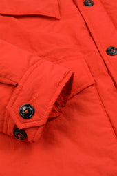 Padded field jacket crafted from a water-repellent nylon–cotton blend fabric. Orange - Orange juice