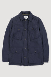 Padded field jacket crafted from a water-repellent nylon–cotton blend fabric. Blue - Navy
