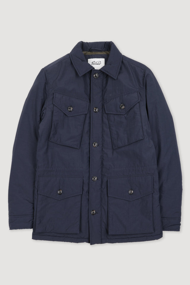 Padded field jacket crafted from a water-repellent nylon–cotton blend fabric. Blue - Navy