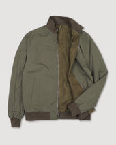 Reversible zip jacket in suede leather and waterproof fabric. Green - Muschio/Military