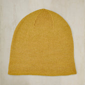 Muskox Knitted Beanie Hat In Gold