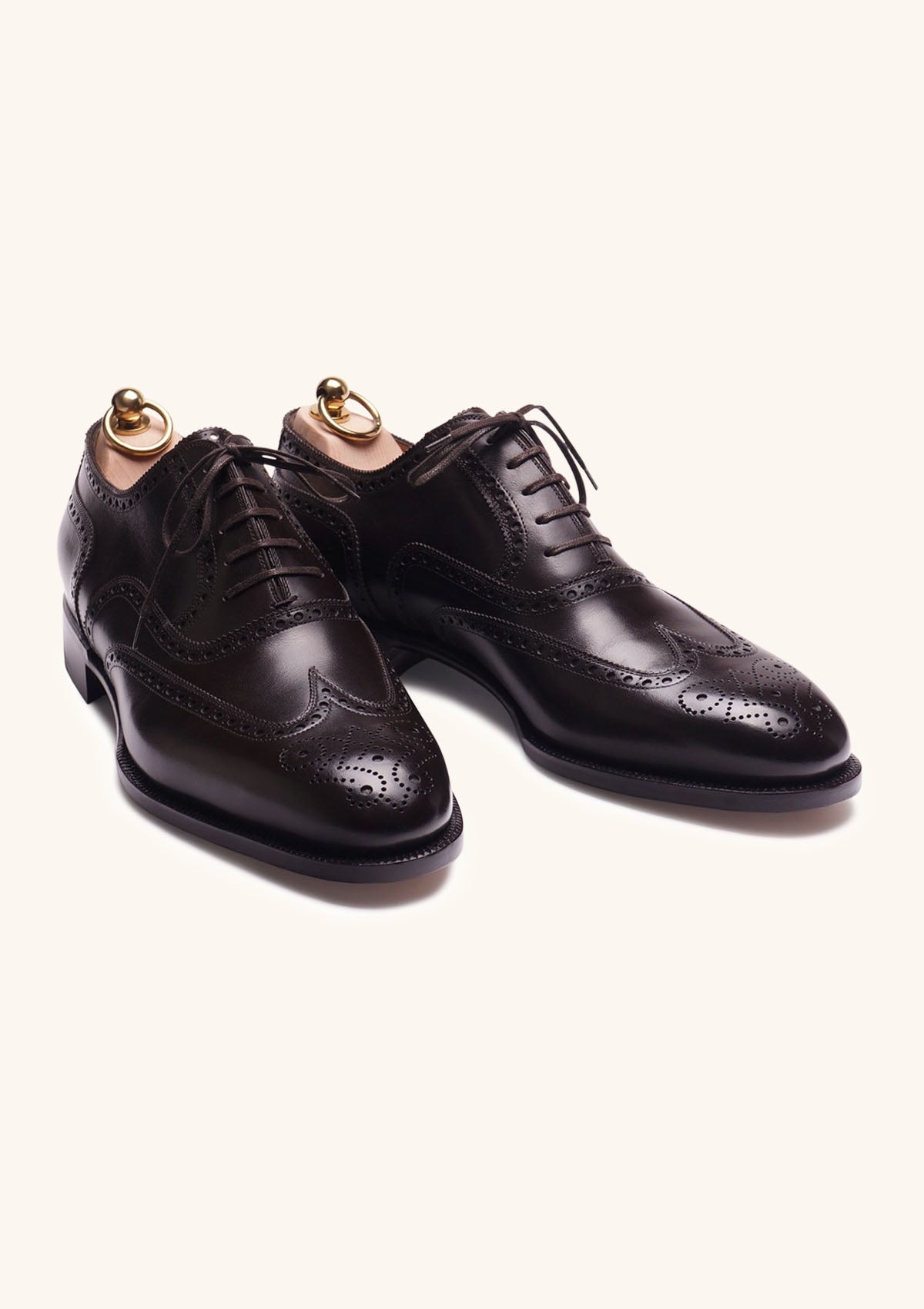 Wingtip Brogue Oxfords With Medallion