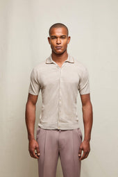 Polo in lino e cotone beige con bottoni