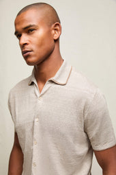 Polo in lino e cotone beige con bottoni