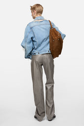 Distressed denim jacket