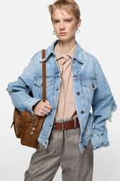 Distressed denim jacket