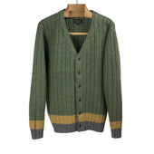 Cabled rib stitch cardigan in olive green with mustard and grey hem