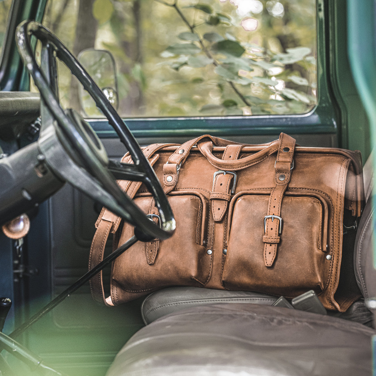 Deep Pocket Leather Duffle Bag