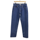 Tapered five pocket jeans in medium wash selvedge denim
