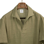 Exclusive skipper polo in khaki green dyed textured cotton