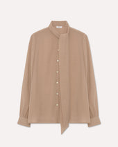Camicia beige con fiocco al collo