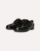 Derby in pelle di toro nero