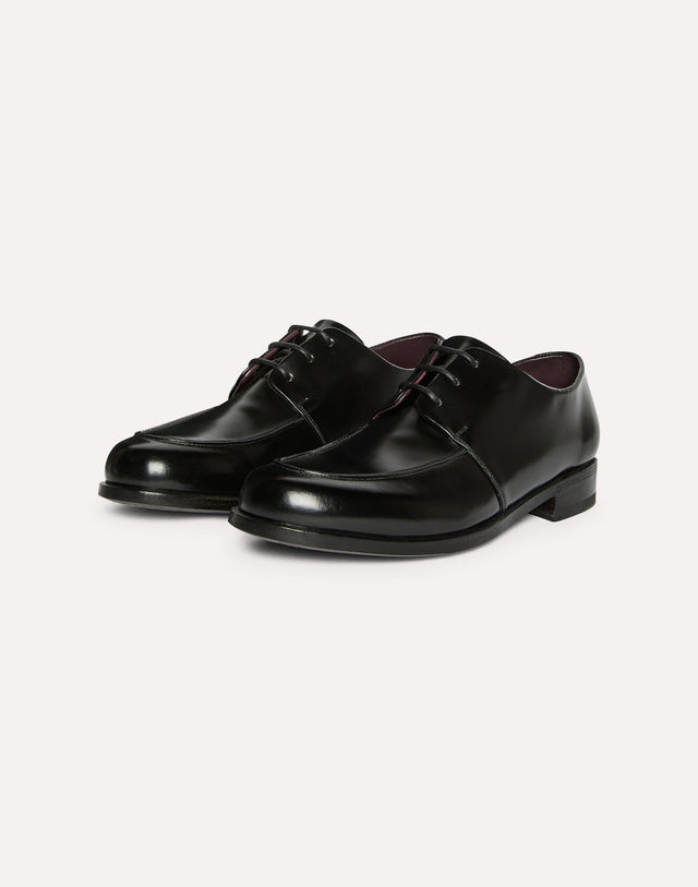 Derby in pelle di toro nero
