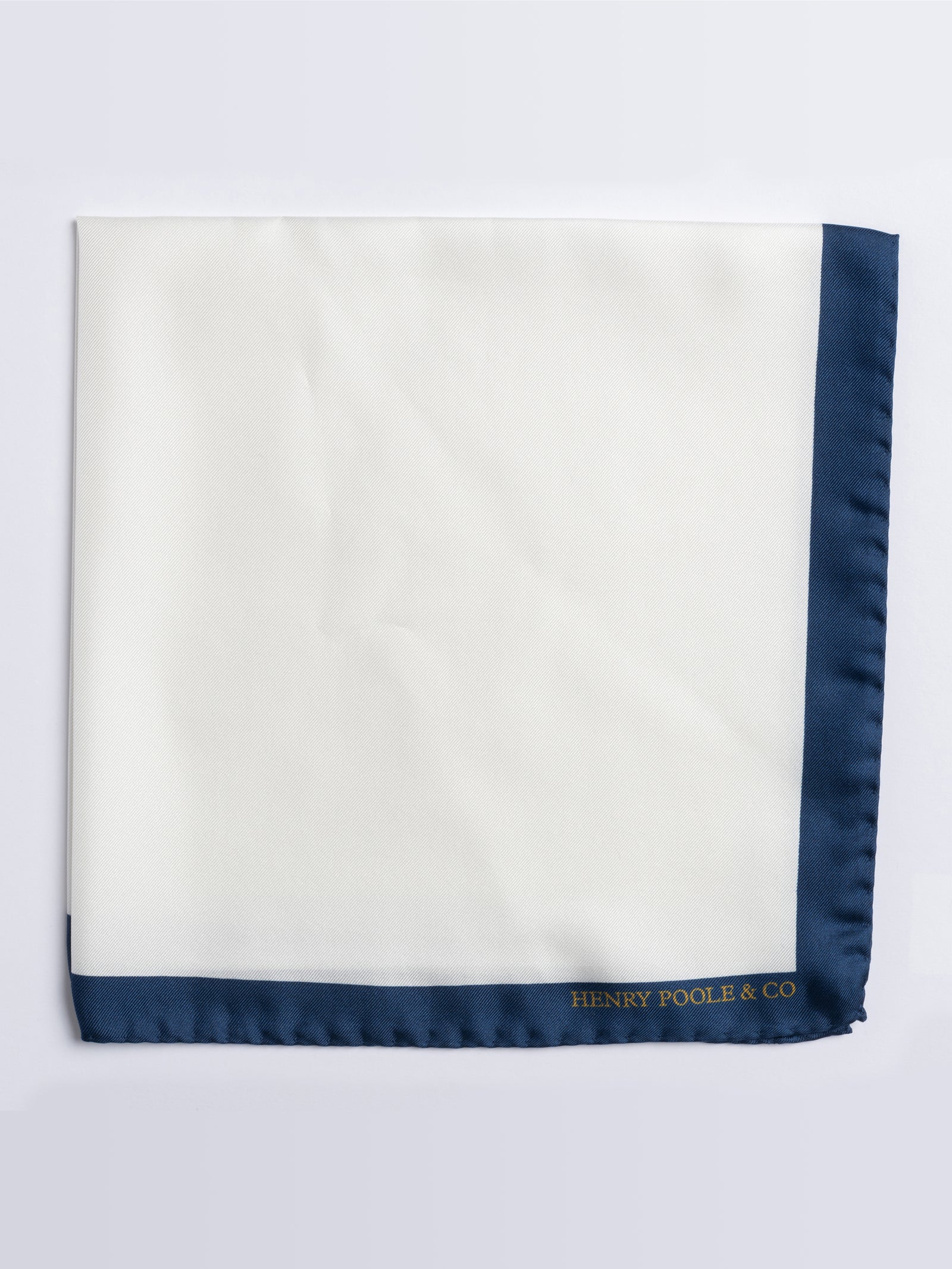 Ivory with navy pocket square