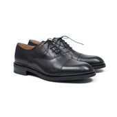 Montaigne cap-toe oxford shoes in lisse noir black leather