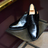 Pearce en cuir noir (Archives)