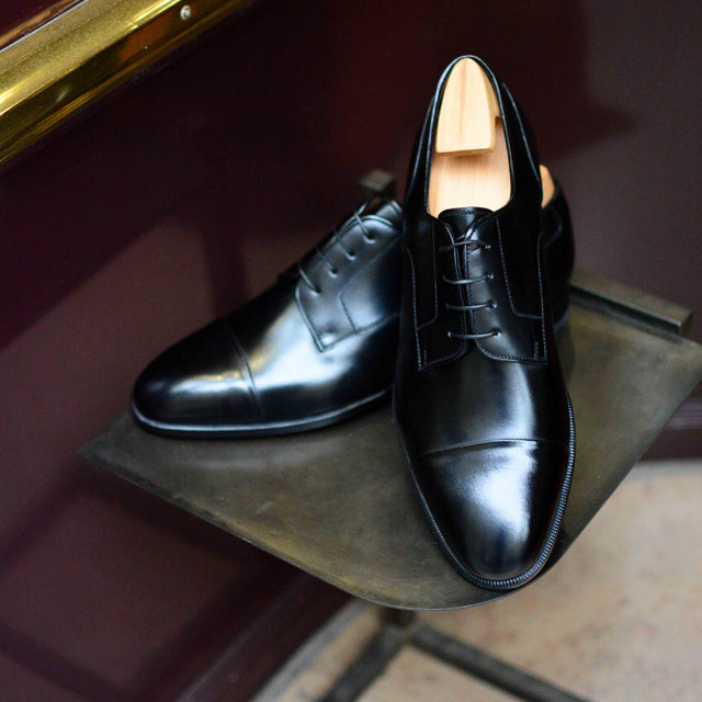 Pearce en cuir noir (Archives)