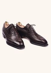 Dark brown brogued Oxfords