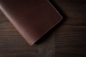 Take Care Passport Case . Deep Brown