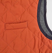 Red Quilted Gilet With Navy Knitted Back