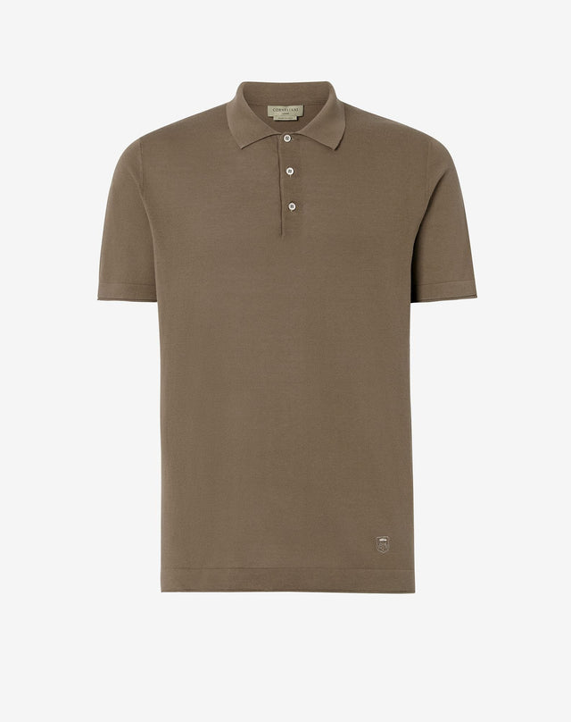Polo verde con bottoni in cotone crêpe