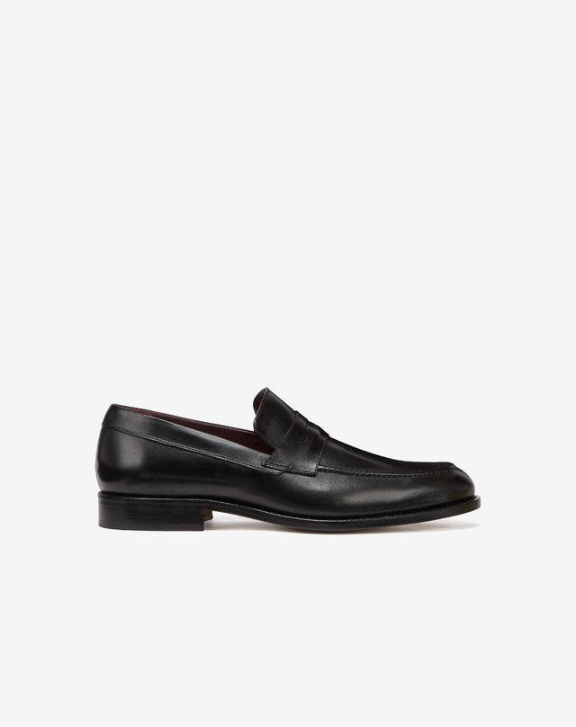 Slip on nere in pelle