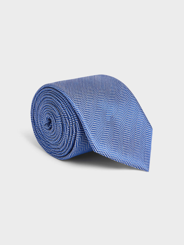 Cravate large bleue à motif