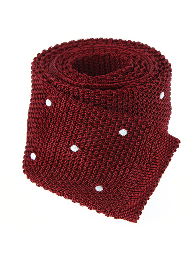 Garnet red knit tie with white polka dots