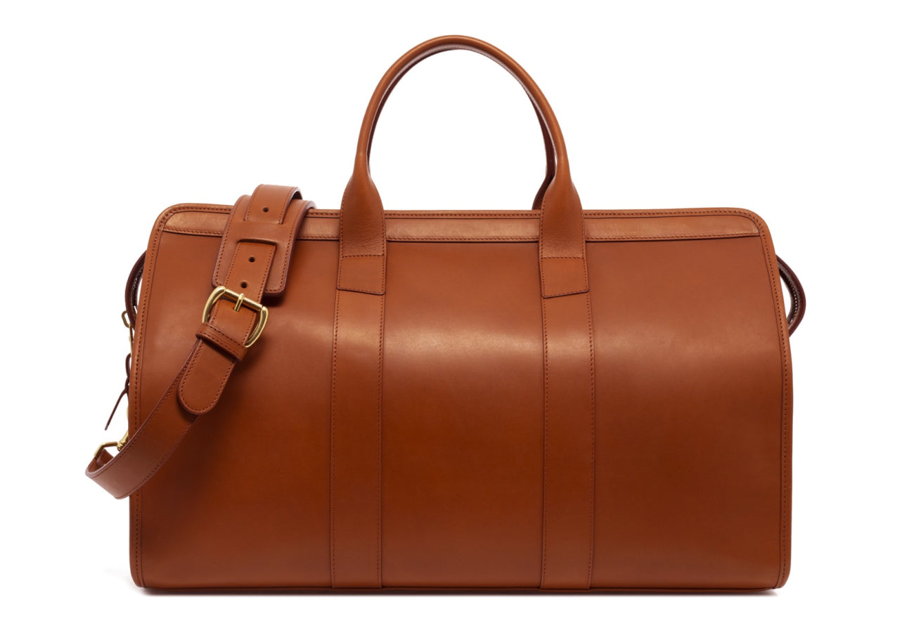 Signature Travel Duffle Belting Cognac Lined 5 Brass Feet